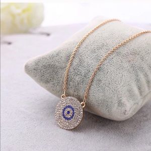 Rose gold evil eye pendant